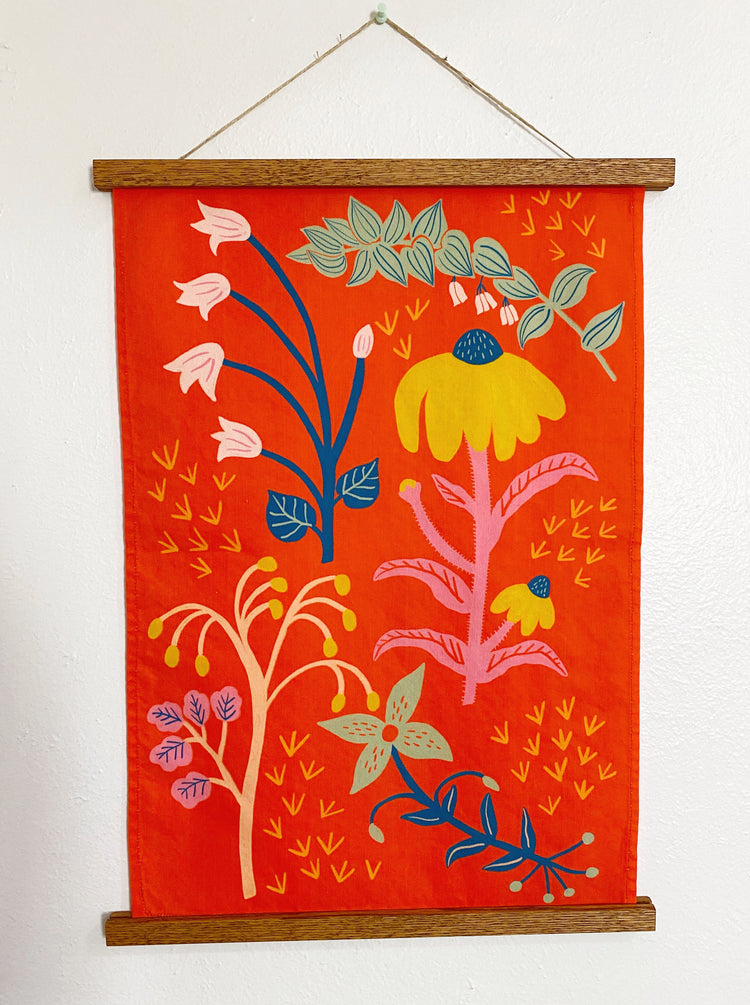 wildflower fabric wall hanging with wooden poster hanger
